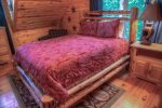 Upper level queen size bed with private bath